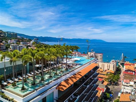 Book your stay at the most exciting new Pier 57 Condo in an ultra-luxurious, higher floor corner unit with stunning views of the Bay & Los Muertos Pier. . Pier 57 puerto vallarta reviews